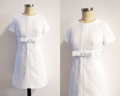 two images of a white dress on a mannequin head stand, one showing the front and back