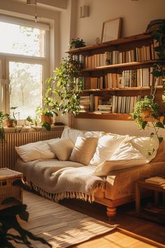 a living room filled with furniture and lots of plants