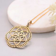 "Size:- Adjustable Material:-Brass Color :- Gold Color, Silver Color These lockets are strong and sturdy for everyday use. Length is 16 Cm and you can adjust up to 3 Cm so full length is 19 Cm Don't miss the rest of the collection, click the link below👉 https://www.etsy.com/in-en/shop/Mamtasilverstore?ref=seller-platform-mcnav Don't miss the rest of the collection of Pendant Necklace click the link below👉 https://www.etsy.com/in-en/shop/Mamtasilverstore?ref=seller-platform-mcnav Note:- These are not stock photos - these are actual photos taken of the item listed. However, since screen resolutions vary, the colors \"in-person\" may be slightly different than you see on your monitor. If you have any questions - please feel free to send me a message. Handmade from either solid Nickel free b Sacred Geometry Jewelry, Geometry Jewelry, Schmuck Gold, Mandala Necklace, Pendant Necklace Simple, Seed Of Life, Meaningful Jewelry, Best Birthday Gifts, Gold Flower