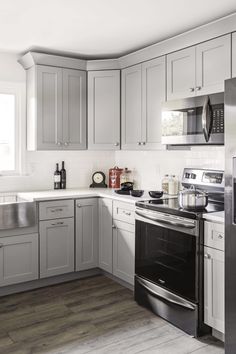 the kitchen is clean and ready for us to use it's stainless steel appliances