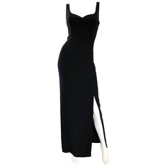 Sexy, yet sophisticated 1990s BOB MACKIE black crepe bodycon evening dress! Features an elegant sweetheart neckline, with satin trim. Figure flattering silhouette that hugs the body in all the right places. Thigh high side slit reveals just the right amount of skin. Fully lined. Hidden metal zipper up the back with hook-and-eye closure. The perfect classic timeless addition that will always remain in style. Great belted or alone. In great condition. Marked Size US 10 (runs true to size) Measurem Gowns Bodycon, Bodycon Gown, Gowns Vintage, Vintage Ball Gowns, Stage Clothes, Vintage Evening Gowns, Gowns Black, Bodycon Evening Dress, Gown Vintage