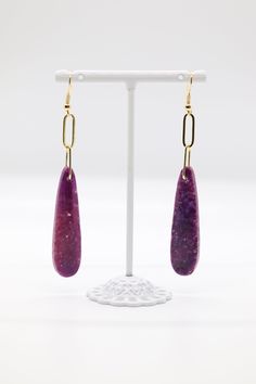 The "Variety Teardrop Geometric Natural Stone Amethyst Imperial Jasper Drop Paperclip Dangle Earrings" are a versatile and eye-catching accessory featuring a combination of teardrop, geometric, and paperclip elements adorned with natural stone beads like amethyst and imperial jasper. These earrings offer a unique blend of shapes and colors, making them a captivating choice for those who appreciate distinct and eclectic jewelry. Purple Clip-on Jewelry As Gift, Purple Clip-on Jewelry As A Gift, Purple Clip-on Jewelry For Gifts, Purple Clip-on Jewelry Gift, Purple Clip-on Jewelry For Gift, Purple Teardrop Metal Earrings, Purple Long Drop Earrings With Ear Wire, Handmade Purple Drop Clip-on Earrings, Purple Drop Crystal Earrings