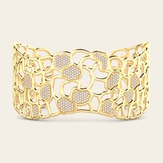 An elevated version of our classic Canyon Cuff, this piece includes the brilliance of diamonds that shine on every twist and turn of the wrist. A wearable work of art that seamlessly blends avant-garde style with timeless luxury. 18k Yellow Gold Diamonds (1.38 cts) Polished Finish S/M: 5 1/2"L x 1 1/8"W M/L: 6 1/4"L x 1 1/8"W Luxury Diamond Evening Bracelet, Luxury Evening Diamond Bracelet, Luxury Diamond Bracelet With Diamond Accents For Evening, Everyday Luxury White Gold Diamond Cuff Bracelet, Luxury Diamond Cut Bracelet For Evening, Luxury Yellow Gold Bangle For Evening, Luxury Diamond Bangle For Formal Occasions, Modern Cuff Bracelet With Diamond Accents For Formal Events, Designer Diamond Cuff Bracelet Bangle