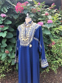 "Thank You If You Favored One of My Items! You Will Receive 10% Off an Item of Your Choice, Unless It Is on Sale, CODE17. Thank You 80's DRESSY MUMU/80's Vintage Kaftan/Vintage Abaya/80's Blue Abaya/Vintage Caftan Dress/Vintage MuMu Dress/Abaya Kaftan/ MINT Condition Circa DRESS MUMU in Royal Blue with Gold Embroidery You Are Currently Viewing a Beautiful Vintage 1980's Blue long Sleeve MuMu Kaftan Abaya Dress. This Dress Features Beautiful Gold Embroidery that is Around the Front and Back Yoke, Bohemian Floor-length Kurta For Traditional Ceremonies, Blue Bohemian Kurta For Transitional Season, Blue Embroidered Long Abaya, Blue Long Sleeve Thobe With Dabka Details, Blue Long Sleeve Thobe With Dabka, Embroidered Blue Long Sleeve Abaya, Bohemian Blue Floor-length Kurta, Blue Bohemian Kurta With Traditional Drape, Bohemian Maxi Length Kurta With Dabka Detail