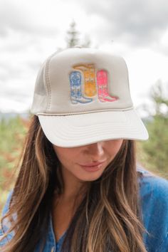 Details Tan trucker hat with embroidered design Fitted, snapback Approximately 24" around the head and 7.5" across bill Materials and Care Otto Brand 100% polyester Patterns may vary Materials may have natural variations Colors may vary from different viewing device