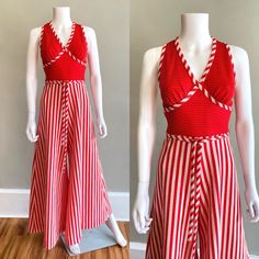 ADORABLE 1970s jumpsuit! Made of a textured polyester knit, red and white stripes, with super cute criss cross detail on the bodice. The legs are SUPER WIDE! Has its original fabric belt. Zips up the back. Label is "Gay Gibson" Excellent condition Size : fits like an Xs / Small Bust - 32 - 36 Waist - 26 - 27, can be tied smaller Hips - up to 40 Inseam - 28 Rise - 14 Torso (from shoulder to crotch seam) - 30 I aim to provide accurate descriptions and measurements. To best determine size, compare Red Retro Jumpsuits And Rompers For Summer, Red And White Overalls, Vintage Red Straight Leg Bottoms, Red 1970s Style Summer Dress, 1970s Jumpsuit, Cute Red Cotton Jumpsuit/romper, White Candy, Candy Stripes, Fabric Belt