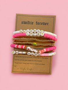 Gift your favorite Swiftie some bracelet love! 5 pink and gold bracelets to wear and share <3 Adjustable Pink Gold Bracelet For Valentine's Day, Personalized Pink Friendship Bracelets For Valentine's Day, Pink Name Bracelet For Friendship On Valentine's Day, Pink Name Bracelet For Friendship, Valentine's Day Pink Name Bracelet With Letter Beads, Adjustable Pink Stackable Friendship Bracelets, Trendy Everyday Friendship Bracelets For Valentine's Day, Adjustable Pink Stackable Charm Bracelet, Adjustable Stackable Pink Friendship Bracelets