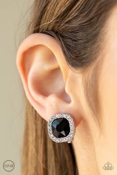 A border of glassy white rhinestones spins around a black gem center for a refined flair. Earring attaches to a standard clip-on fitting. Sold as one pair of clip-on earrings. Black Gems, Faceted Gems, Silver Frames, Whimsical Fashion, Paparazzi Accessories, White Rhinestone, Stretchy Bracelets, Affordable Jewelry, Silver Studs