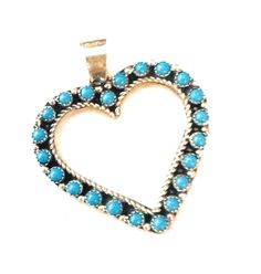 New without tags BRAND : Nizhoni Traders LLC JEWELRY TYPE : pendant TYPE : Pendant SHAPE : Heart COLOR : Blue STYLE : Pendant METAL : Sterling Silver TRIBAL AFFILIATION : Zuni MAIN STONE : Turquoise Beautiful ZuniTurquoise & Sterling Silver Petit Point Heart Pendant. Such amazing craftsmanship! Pendant measures 1 3/4 inches long and 1 3/8 inches wide. Bale measures 1/4 of an inch across. Pendant only. Stones are natural and may vary. Thank you for looking at our items. Please contact us if you h Turquoise Heart Wedding Jewelry, Turquoise Heart-shaped Wedding Jewelry, Turquoise Heart Pendant Jewelry With Natural Stones, Blue Turquoise Heart Pendant Necklace, Blue Bohemian Heart Pendant Jewelry, Bohemian Blue Heart Pendant Jewelry, Unique Heart-shaped Turquoise Jewelry, Heart-shaped Silver Turquoise Necklace For Gift, Heart-shaped Turquoise Necklace With Heart Charm As Gift