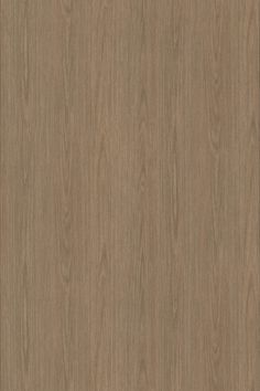 an image of wood grained surface with light brown color and dark stain on it