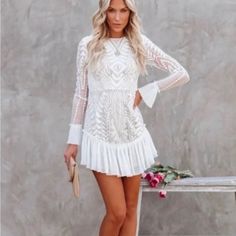 Ivory Lace Ruffle Mini Dress - Saints + Secrets . Brand New Without Tags. Elegant Flowy Mini Dress With Ruffles, Long Sleeve Ruffled Mini Dress For Wedding, White Flowy Mini Dress For Party, Elegant Ruffle Hem Dress For Brunch, White Lace Mini Dress With Ruffle Hem, Elegant Mini Dress With Ruffle Hem For Garden Party, Chic Lace Dress With Ruffle Hem, Chic Mini Dress With Ruffle Hem For Wedding, Fitted White Dresses With Ruffle Hem