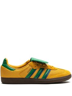 yellow/green mesh design suede panelling signature 3-Stripes logo oversize tongue front lace-up fastening round toe flat rubber sole These styles are supplied by a premium and authenticated sneaker marketplace. Stocking only the most sought-after footwear, they source and curate some of the most hard to find sneakers from around the world. This item is in size 8½ and the color is Yellow Sambas, Strawberry Jams, Unisex Shoes Sneakers, Yellow Sneakers, Baskets Adidas, Adidas Samba Sneakers, Shoes Uk, Mesh Design, Adidas Samba