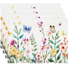 four napkins with colorful flowers and butterflies on them