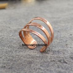 Pure Copper Wrap Ring ,  Finger Ring, Solid Copper Ring , Healing Copper Jewelry, Hammered Copper Ring ,Adjustable Ring, Toe Copper Ring, Product Detail:-  Metal: Solid Copper Ring Style : Healing Ring -: We use Pure Copper Jewelry The hammered copper ring is formed like an overlapping coil so that they can be slightly adjusted to fit. --------------------------------------------------------------------- Best Friend Gifts, Bestseller Bridesmaid Gift, Best Couple Gift Jewelry, gift for bride, dec Adjustable Rose Gold Toe Ring, Adjustable Rose Gold Metal Ring, Adjustable Copper Metal Ring Jewelry, Adjustable Nickel-free Copper Ring, Adjustable Copper Nickel-free Rings, Adjustable Metal Toe Rings As Gift, Adjustable Metal Toe Rings Ideal For Gifts, Adjustable Open Band Toe Rings As Gift, Handmade Adjustable Open Band Midi Rings