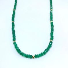 Crafted from genuine green onyx, this classic necklace is sure to add elegance to any look. The soft tones of the green stone will bring an exquisite accent to any necklace collection. Length 16" extender 1.5" Green Onyx represents growth, abundance, and material success. Green Onyx helps with centering during meditation, and for connecting with Higher powers. Heart Chakra. -This information is intended for spiritual support only- Beads 3x2mm Findings 14K GF Classic Green Gemstone Necklace, Spiritual Green Necklace For May Birthstone, Classic Green Gemstone Beads Necklace, Spiritual Emerald Necklace With Natural Stones, Classic Green Necklace For May Birthstone, Elegant Healing Necklace With May Birthstone, Classic Green Single Strand Necklace, Elegant Green Emerald Necklace Adjustable, Elegant May Birthstone Necklace For Healing