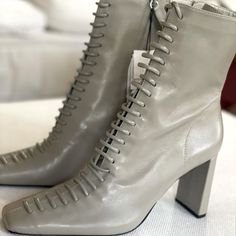 Light Grey Zara Boot. Lace Up The Front, Side Zipper, Heel Boot. Never Worn, New With Tags. Formal Lace-up Boots For Spring, Designer Square Toe Spring Boots, Designer Square Toe Boots For Spring, Zara Boots For Spring Formal Occasions, Zara Formal Boots For Spring, Formal Spring Boots With Square Toe, Formal Square Toe Boots For Spring, Formal Spring Square Toe Boots, Designer Boots With Reinforced Heel For Spring