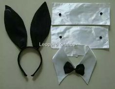 two pieces of clothing with black and white bows on them, one is made out of material