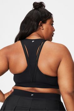 Boost Medium Impact Sports Bra Fabletics black female Activewear >> Womens >> Sports Bras >> Sports Bra >> Medium Impact plus Training/Yoga and Studio Removable Bra Cups/Strappy Classic style with strappy back details Sports Activewear With Light Support And Strappy Back, Activewear With Light Support And Strappy Back For Sports, Sporty Supportive Activewear With Strappy Back, Compressive Activewear For Sports With Strappy Back, Compressive Activewear With Strappy Back For Sports, Supportive Sporty Activewear With Strappy Back, Strappy Back Light Support Activewear For Sports, Breathable Athleisure Activewear With Strappy Back, Sporty Strappy Back Activewear For Pilates