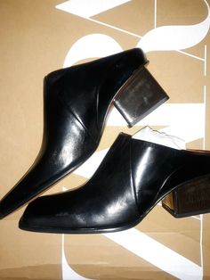 NWT $129 ZARA BLACK LEATHER SQUARE TOE CLOG SILVER HEEL MULES 1204/610 SZ 9 BLOG FAV!. Shipped with USPS Priority Mail. *NOTE PLEASE ASK ALL QUESTIONS AS I NO LONGER ACCEPT RETURNS ANYMORE ALSO PLEASE KNOW YOUR SIZE OR RESEARCH IN CERTAIN BRANDS AS I AM NOT RESPONSIBLE FOR SIZING ISSUES Trendy Mules With Sculpted Heel For Work, Trendy Block Heel Mules For Formal Occasions, Trendy Formal Mules With Block Heel, Trendy Pointed Toe Mules With Stacked Heel, Trendy Slip-on Mules With Sculpted Heel, Modern Mules With Reinforced Heel For Fall, Modern Closed Toe Mules For Fall, Modern High Heel Mules For Fall, Modern Pointed Toe Mules With Stacked Heel