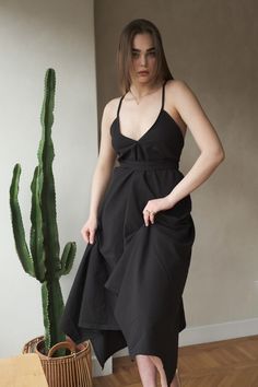 Our stylish, must-have version of the essential LBD (little ​beach dress), the Sage maxi is a flowing asymmetric dream that’s perfect for mid-summer events, beach days, and travel. The silhouette is inspired by the tranquil vibes of Tulum’s beaches and bustling energy of its town center. It features long straps you can wrap twice around the waist for an adjustable fit. Breathable fibers keep you cool as you lounge, explore, and indulge all summer long. Elegant Asymmetrical Summer Dress For Brunch, Chic Asymmetrical Summer Dress, Chic Asymmetrical V-neck Summer Dress, Chic Summer Asymmetrical Dress, Chic Asymmetrical V-neck Dress For Summer, Chic Black Flowy Beach Dress, Chic Asymmetrical Summer Dress For Day Out, Asymmetrical Maxi Dress For Spring Beach, Black Flowy Chic Beach Dress