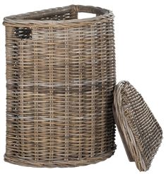 a large round wicker laundry basket with lid and liner, next to it's contents