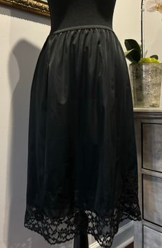 Beautiful black half slip with a wide lace hem can add such interest to a skirt or dress! I estimate the size to be a Medium. Message me for more exact measurements. The condition is excellent. I do not make exchanges or accept returns. Half Slip, Lace Hem, A Skirt, Black Vintage, Favorite Outfit, Art Collection, Bathing Beauties, Display Homes, Slip On