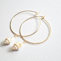 Gold Coastal Shell Jewelry, Brass Shell Jewelry For Beach, Beach Shell Brass Jewelry, Adjustable Gold Shell, Handmade Gold Shell With Beachy Style, Gold Shell-shaped Hoop Earrings For Beach, Handmade Gold Hoop Earrings For Vacation, Adjustable Gold Shell With Beachy Style, Beachy Gold Shell Earrings