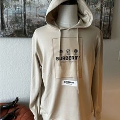 Burberry Hoodie Eu Size Xxl Authentic Logo Detail Long Sleeve Hoodie For Fall, Long Sleeve Hoodie With Logo For Fall, Long Sleeve Hoodie With Logo Detail For Fall, Fall Hoodie With Logo Detail, Designer Hooded Hoodie For Winter, Designer Hooded Hoodie For Fall, Designer Cotton Hooded Hoodie, Winter Trendy Sweatshirt With Logo Detail, Designer Winter Hoodie