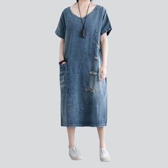 Introducing our 2023 Spring-Summer Collection: the Laid-back Distressed Denim Dress! Perfect for a day out with friends or a music festival. this stylish dress is the ultimate expression of distorted elegance. Crafted from premium quality denim. it's made to last!Key Highlights: Grunge Galore: Inspired by the iconic '90s grunge movement. this dress exudes an effortlessly cool attitude. Distinctive Distressed Pattern: Expertly crafted wear and tear. capturing a raw. unfiltered essence. Sleek Slim Denim Blue Short Sleeve Cotton Midi Dress, Denim Blue Cotton Midi Dress Short Sleeve, Casual Short Sleeve Denim Midi Dress, Casual Cotton Midi Dress, Casual Short Sleeve Denim Blue Midi Dress, Summer Denim Blue Short Sleeve Dress, Trendy Cotton Short Sleeve Midi Dress, Short Sleeve Washed Blue Denim Dress For Summer, Washed Blue Short Sleeve Denim Dress For Summer