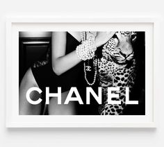 a black and white photo with the word chanel on it