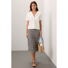 White Tencel Span Plain Weave (54% Hemp, 44% Tencel‚Ñ¢ Lyocell, 2% Spandex). Top. Short sleeves. V-neck. Front button closure. 23" from shoulder to hemline. Imported. Lucy White, Resort Shirt, Spandex Top, Marine Layer, Rent The Runway, Closet Designs, Light Wash Denim, Plain Weave, Linen Shirt