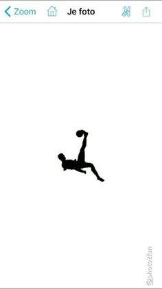 a person jumping in the air to catch a ball with their feet and arms, silhouetted against a white background