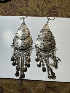 Antique Earrings different design Metal Tassel Drop Earrings For Pierced Ears, Silver Nickel-free Drop Tassel Earrings, Vintage Silver Chandelier Earrings, Silver Metal Tassel Earrings Gift, Traditional Silver Dangle Clip-on Earrings, Silver Tassel Earrings Gift, Unique Dangle Linear Earrings, Silver Dangle Tassel Earrings For Pierced Ears, Teardrop Pierced Earrings For Festivals