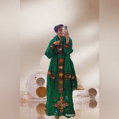 Introducing The Raya Wollo Amhara Ethiopia Traditional Gumaj Dress Featuring A Captivating Raya Design In (Dork Green) This Exquite Ethic Attire Boasts On Elastic Waistband For A Comfortable Fit Elevate Your Fashion Game Raya Wollo Amhara Ethiopia Traditional New Raya Design Dark Green Gumaj Dress With Elastic Waist Band Traditional Ethiopian Dress, Raya Design, Ethiopian Dress, Dress With Elastic Waist, Traditional Dress, Ethiopia, Waist Band, Traditional Dresses, Fashion Games