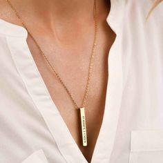 PERSONALIZED VERTICAL BAR NECKLACE This stylish necklace with it's free moving square bar pendant can be personalized to create a treasured and special gift for a loved one. The bar can be engraved with your special message, a name, or date which the recipient can choose to wear with the message showing or turn the slider to keep it secret. CHARACTER LIMIT Up to 12 characters per bar Up to 4 sides engraving ITEM SPECIFICATIONS • Material: High Quality Solid 925 Sterling Silver• Finish: 925 Sterl Minimalist Bar Necklace With Custom Name, Minimalist Bar Necklace With Customized Rectangular Pendant, Minimalist Rectangular Bar Necklace As Personalized Gift, Minimalist Rectangular Bar Necklace For Personalized Gift, Personalized Rectangular Jewelry For Best Friend Gift, Minimalist Personalized Rectangular Bar Necklace, Minimalist Rectangular Pendant Bar Necklace For Personalized Gift, Necklace Name Design, Vertical Bar Necklace