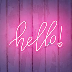 a pink neon sign that says hello