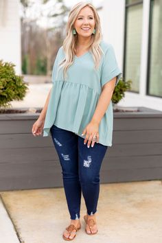 Expect many wide-eyed gazes when you're wearing this top! This top has a sleek design with a pretty aloe color you can dress up or down and style for every occasion! It's comfortable for all day wear, has a figure-flattering baby doll fit, and features the cutest cuffed-sleeves for the ultimate trendy look! Simply, style this top with skinnies and booties for an easy everyday outfit! 100% Polyester Chic Relaxed Fit Solid Color Top, Green Flowy V-neck Top, Versatile Solid Color Spring Top, Chic Solid Color Top For Layering, Stretch Solid Color Tops For Day Out, Versatile Solid Color Tops For Day Out, Green Flowy Short Sleeve Top, Relaxed Fit Solid Color Tops For Spring, Green Tops For Layering