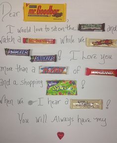 a white board with candy and writing on it