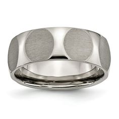 a men's wedding band with two circles in the center