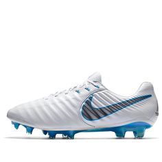 the nike vapor soccer shoe is white and blue