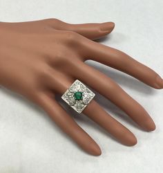 2.44 Carats Natural Emerald and VS Diamond 14K Solid White Gold Ring Suggested Replacement Value: $11,800.00 Total Natural Green Emerald Weight is: .84 Carats (transparent) Emerald Measures: 5.50 x 4.91mm Natural Round Diamonds Weight: 1.60 Carats (color G / Clarity VS2-SI1) Ring total weight: 11.3 grams Disclaimer: all weights, measurements and colors are approximate and may vary slightly from the listed dimensions or as seen in the image. All pictures are magnified to show the smallest of deta Collectible Green Diamond Jewelry, Elegant Silver Emerald Ring Collectible, Gia Certified Art Deco Jewelry As Gift, Gia Certified Art Deco Jewelry Gift, Gia Certified Art Deco Jewelry For Gift, Art Deco Green Platinum Jewelry, Art Deco Diamond Jewelry With Vs Clarity, Silver Gia Certified Elegant Emerald Ring, Silver Elegant Emerald Ring Gia Certified