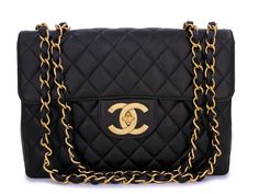 Vintage classic Chanel bags are known for their petal-soft lambskin, 24k gold plated hardware and sturdy craftsmanship. Increasingly harder and harder to find, especially in excellent condition. Boldly Chanel with the oversized CC's and chunky double woven chain in 24k gold plated hardware. Quilted front and back panels and back pocket; interior features two side pockets. This is the model with the oversized hardware - beefier chain, oversized turnlock and all four circular grommets on the top are the "screw-on" kind, not the thin glued-on grommets of the newer flaps. A stunning head-turner of a bag which will never go out of style. In Black lambskin leather and 24k gold plated hardware. Boutique Patina specializes in sourcing and curating the best condition vintage Chanel leather treasure Elegant Gold Double Flap Bag, Elegant Gold Bag With Double Flap, Luxury Bags With Gold Clasp For Formal Occasions, Designer Gold Double Flap Bag, Formal Gold Double Flap Shoulder Bag, Gold Double Flap Shoulder Bag For Formal Occasions, Gold Double Flap Shoulder Bag For Evening, Gold Double Flap Evening Shoulder Bag, Elegant Gold Double Flap Shoulder Bag