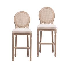 two chairs with white upholstered backrests and caned seat cushions, side by side