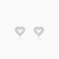 This listing is for Small Diamond Heart Studs, Halo Heart Earrings for women, Bridal Earrings, 14K Solid Gold Dainty Earrings, Bridesmaids gift * Gold : 14K Solid Gold * Gold Color: Yellow Gold, White Gold, Rose Gold * Earring Height: 0.60 cm * Earring Width: 0.50 cm * Diamond CTW: 0.25 ctw  * Diamonds: 20 Pieces * Diamond Quality: GH Color VS Clarity * Made to Order All pictures are taken in natural light. I have tried to show the actual shade and look of the Jewelry. Slight variation shall occur depending on different screen resolutions it is being viewed in.  I also take orders for customized rings necklaces Bracelets etc. Cubic Zirconia Heart Earrings For Wedding On Mother's Day, Yellow Gold Cubic Zirconia Heart Earrings For Wedding, Gold Diamond Earrings For Wedding On Valentine's Day, White Diamond Earrings For Wedding On Valentine's Day, White Gold Earrings For Wedding On Valentine's Day, White Gold Wedding Earrings For Valentine's Day, White Gold Earrings For Wedding And Mother's Day, Valentine's Wedding White Gold Earrings, Elegant Heart Earrings With Halo Design For Wedding