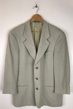 "-Description- >Giorgio Armani beige men's sport coat >three button front >three open pockets on the front >three buttons on the cuffs >lined >size 44 - size based on measurements, tag is marked 52R but chest measurement does not match the size tag - please check all measurements before purchase >high end! >condition: great >color(s): beige >fabric(s): wool polyester blend >brand: giorgio armani >care: dry clean -Measurements- >size: 44 - size based on meas Button-up Beige Blazer, Beige Business Casual Sport Coat With Button Closure, Beige Sport Coat With Button Closure For Business Casual, Beige Sport Coat With Suit Collar And Button Closure, Beige Button-up Business Blazer, Tailored Beige Sport Coat With Buttons, Beige Sport Coat With Notch Lapel And Buttons, Beige Single Button Sport Coat For Semi-formal Occasions, Semi-formal Beige Single Button Sport Coat