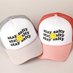 Stay Salty Lettering Printed Trucker Foam Cap with Meshed Back Top off your look with our popular Dad Hat.  It's a cool classic designed to add personal shade wherever you go! Perfect for dog walking, the beach, the gym, the pool, and everyday wear! It's fully adjustable and easy to style! ** 🧢 Detail & Features 🧢 ** Made from 100% polyester.   Soft mesh back trucker hat with Stay Salty lettering print  Lightweight & durable, with adjustable snap tab closure. * Simple and comfortable hat for d White Outdoor Hats With Letter Print, White Letter Print Hat For Outdoor, White Outdoor Hat With Letter Print, Trendy 5-panel Letter Print Baseball Cap, Fun Dad Hat With Letter Print, Fun 5-panel Hat With Letter Print, Fun Letter Print Dad Hat, Fun Letter Print Dad Cap, Casual 5-panel Trucker Hat With Letter Print