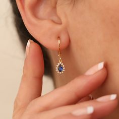 Discover elegance with our 14K Solid Gold Teardrop Earrings, featuring genuine Diamonds & Sapphires - September's gems. Perfect Mother's Day gift, these heirloom-quality dangles shimmer with authenticity and grace, celebrating love and timeless beauty. Experience the heartfelt craftsmanship in each piece. Sapphire symbolizes loyalty, love and longing. It gives positive vitality with the wonderful energy given by its color. Our 14K solid gold dangling drop sapphire earring surrounded by diamonds Gold Sapphire Earrings, Elegant Dangle Teardrop Birthstone Earrings, Elegant Birthstone Teardrop Dangle Earrings, 14k Gold Dangle Teardrop Earrings For Anniversary, 14k Gold Teardrop Dangle Earrings For Anniversary, Sapphire Earrings Drop, Sapphire Drop Earrings, Sapphire Earring, Sapphire And Diamond Earrings