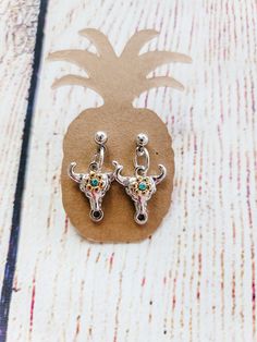 Western fashion is huge in the market right now especially jewelry. Add these dainty bull earrings to your accessories.  Earrings are attached to a nickel and lead free earring post.  Follow us on Instagram! @Fairylandsboutique Follow us on Facebook to keep up with new releases, sales and giveaways!  * SHIPPING * READY TO SHIP! ** Please double check the mailing address before completing your checkout. If items need to re-ship because the address provided was incorrect the buyer will be charged the additional shipping required.  ** Custom order shipping times may vary based on the complexity of the item and workload. * RETURNS * ** I will only refund orders that arrive damaged or broken. If this happens, please contact me and I will try my hardest to get a replacement out as soon as possib Bull Earrings, Cow Jewelry, Cow Earrings, Earrings Western, Bull Head, Earring Post, Free Earrings, Western Jewelry, New Releases