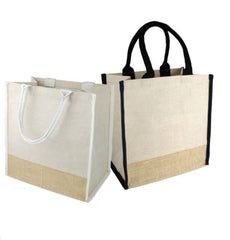 two canvas bags with handles are shown side by side, one is black and the other is white