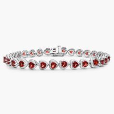 Vividly red heart-shaped garnets sparkle gorgeously along the length of this elegant bracelet, giving it a romantic effect. Garnet Heart, Red Bracelet, Elegant Bracelet, Gemstone Bracelets, Heart Bracelet, A Romantic, Semi Precious Gemstones, Red Heart, Garnet